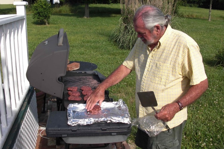 Dad mans the grill.